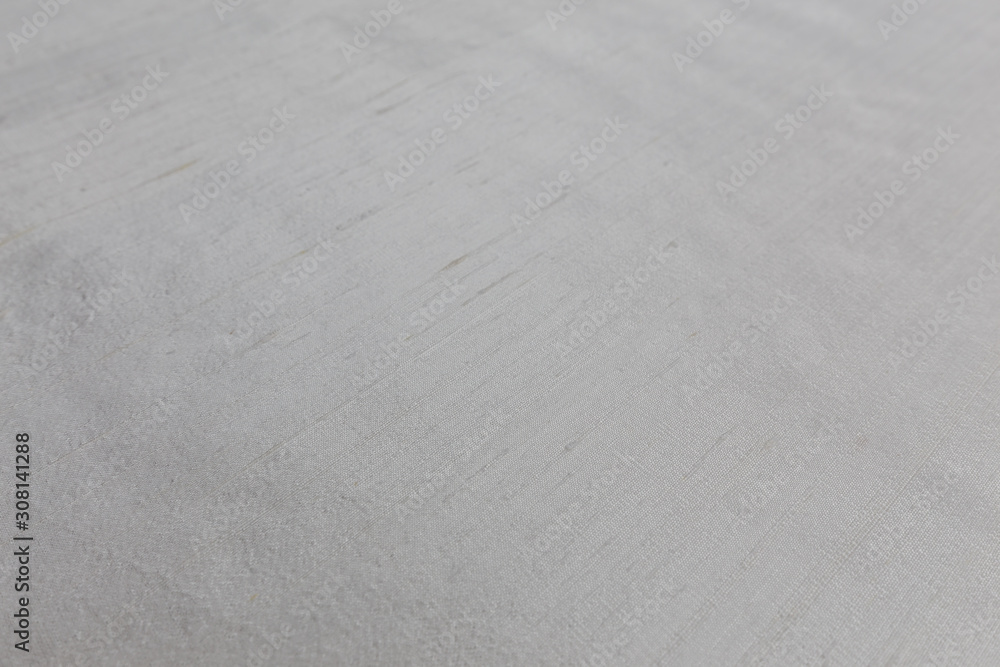 Closeup of white fabric with textile texture background Closeup of white fabric with textile texture background