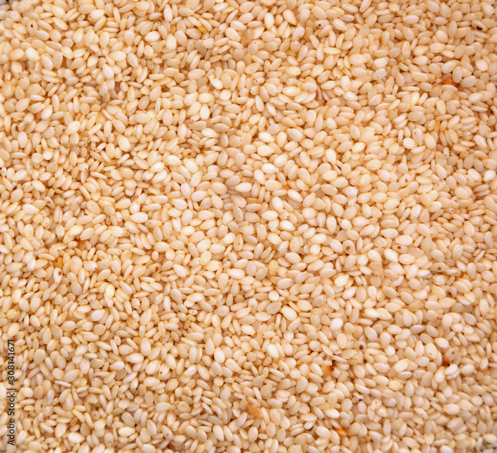 White sesame seeds background