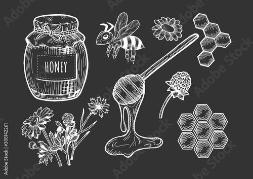 honey set on black background.