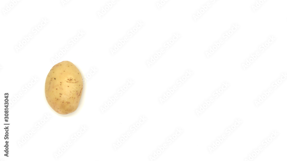 Fototapeta premium Young white potato, top view. Isolated potatoes on a white background. Fresh food for vegetarians. Raw vegetable, root vegetable. Photo harvesting potatoes for a designer.