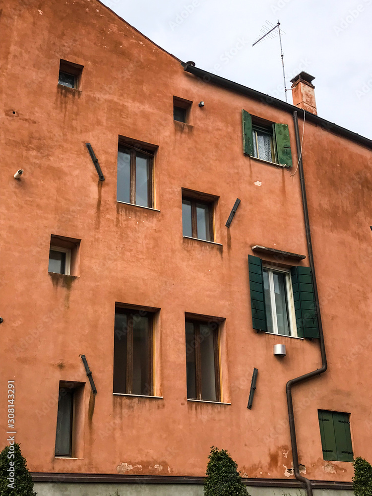 Ocre wall with windows