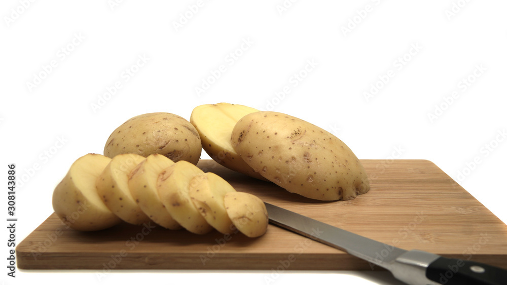 Young white potato, top view. Isolated potatoes on a white background. Fresh food for vegetarians. Raw vegetable, root vegetable. Photo harvesting potatoes for a designer. Young white potato, top view. Isolated potatoes on a white background. Fresh food for vegetarians. Raw vegetable, root vegetable. Photo harvesting potatoes for a designer.