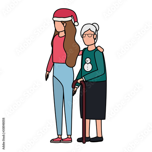 cute grandmother with daughter using christmas hat