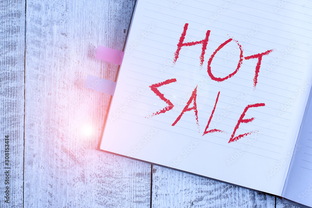 Writing note showing Hot Sale. Business concept for putting products on high discount Great price Black Friday Notebook stationary placed above classic wooden backdrop Writing note showing Hot Sale. Business concept for putting products on high discount Great price Black Friday Notebook stationary placed above classic wooden backdrop