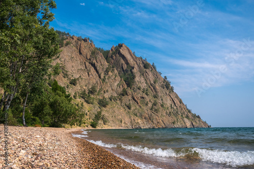 Skriper cliff - a large rock on the shore of Lake Baikal near the village of Big Koty photo