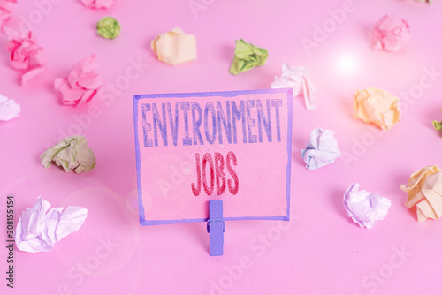 Word writing text Environment Jobs. Business photo showcasing jobs that contribute to preserve or restore the environment Colored crumpled papers empty reminder pink floor background clothespin