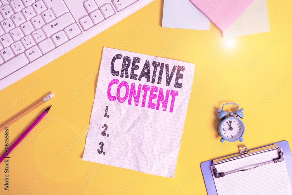 Text sign showing Creative Content. Business photo text providing showing with the type of content they re craving Copy space on notebook above yellow background with keyboard on table Text sign showing Creative Content. Business photo text providing showing with the type of content they re craving Copy space on notebook above yellow background with keyboard on table