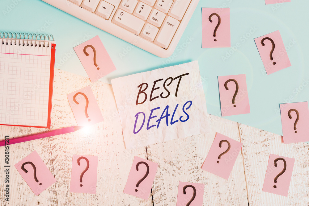 Handwriting text writing Best Deals. Conceptual photo very successful transaction or business agreement or a bargain Writing tools, computer stuff and math book sheet on top of wooden table Handwriting text writing Best Deals. Conceptual photo very successful transaction or business agreement or a bargain Writing tools, computer stuff and math book sheet on top of wooden table