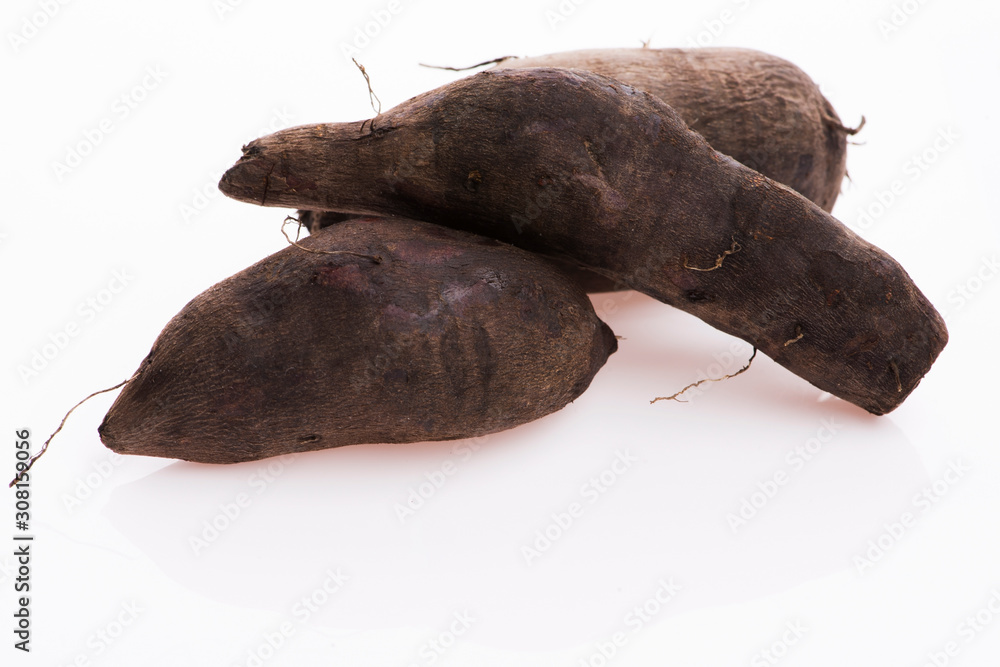 Fototapeta premium Fresh Yacon roots on white background