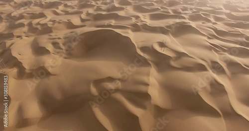 aerial view of sand and waves