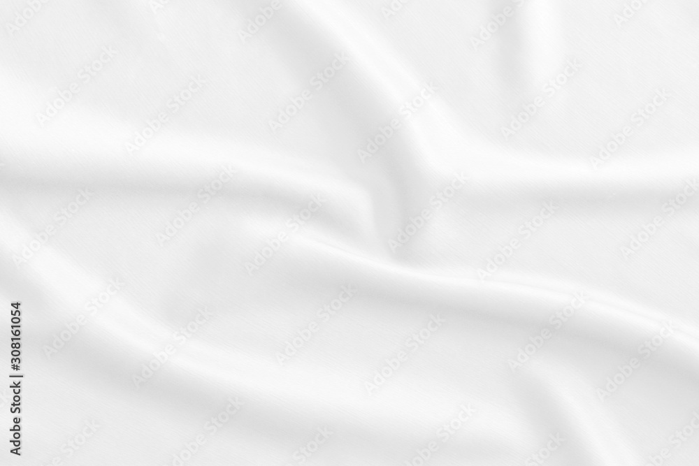 White fabric, cloth soft waves texture background. Soft image.