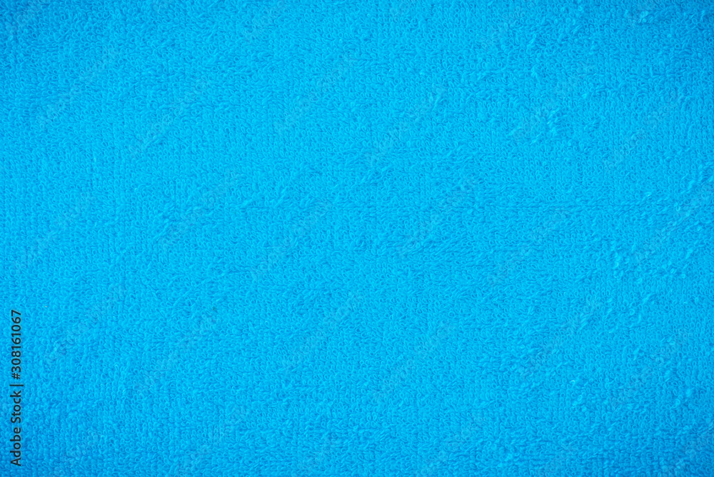 Blue towel, cloth, fabric surface backgrounds/Textures. Soft image. Blue towel, cloth, fabric surface backgrounds/Textures. Soft image.