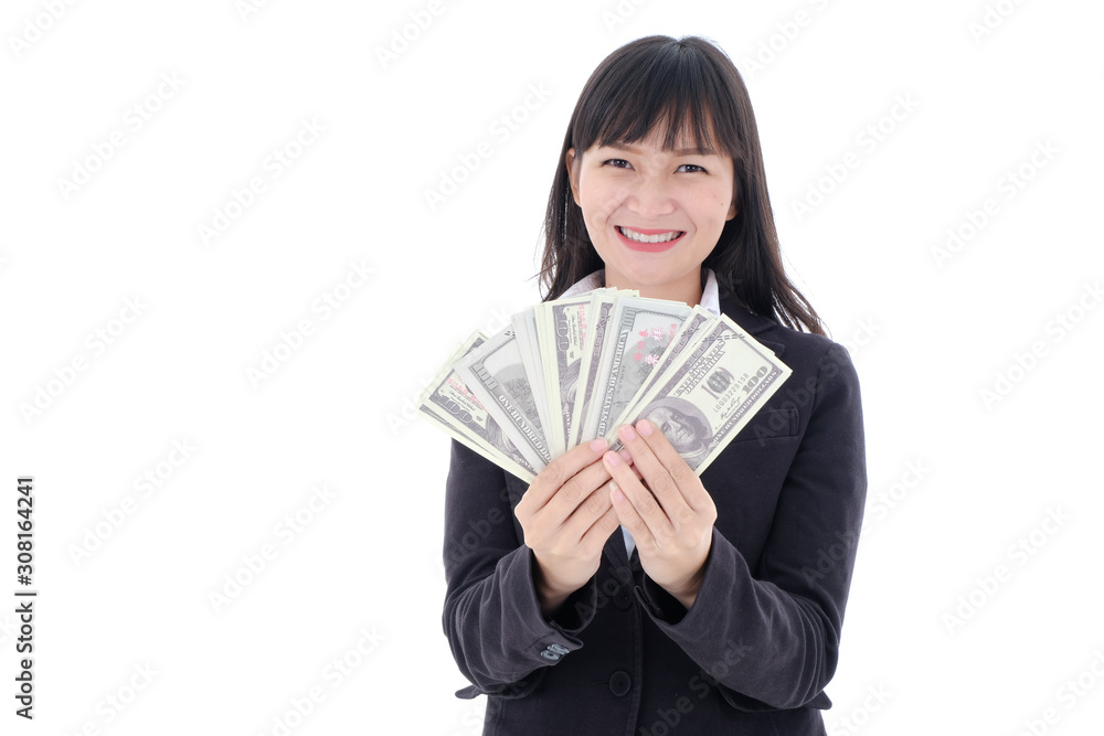 Portrait of young Asian business woman wearing a black suit be a smile and holding showing money cash fan of 100 us bills on white background, studio isolated. Portrait of young Asian business woman wearing a black suit be a smile and holding showing money cash fan of 100 us bills on white background, studio isolated.