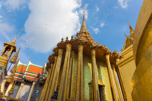 Tourists at the Grand Palace a famous tourist destination that includes the Temple of the Emerald Buddha  Wat Phra Kaew  the most sacred Buddhist temple in Thailand
