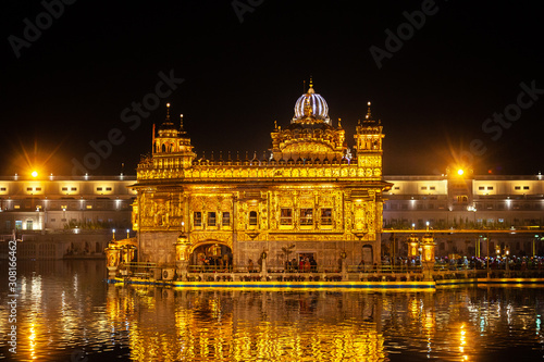 The Famous Golden temple of Amritsar at night, India. Place of Pilgrimage for Sikh religion © Arthur