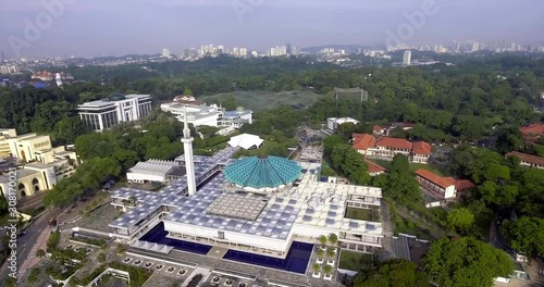 The National Mosque of Malaysia is a mosque in Kuala Lumpur, Malaysia. It has a capacity for 15,000 people and is situated among 13 acres of gardens. photo