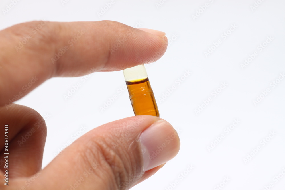 Transparent capsule that contain Nigella sativa oli also known as Habbatusauda or Jintan Hitam. Used for health care purpose as herbal medicine. Transparent capsule that contain Nigella sativa oli also known as Habbatusauda or Jintan Hitam. Used for health care purpose as herbal medicine.