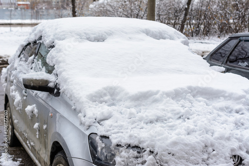 Car Covered In Fresh White Snow, Cars covered in snow after a blizzard.