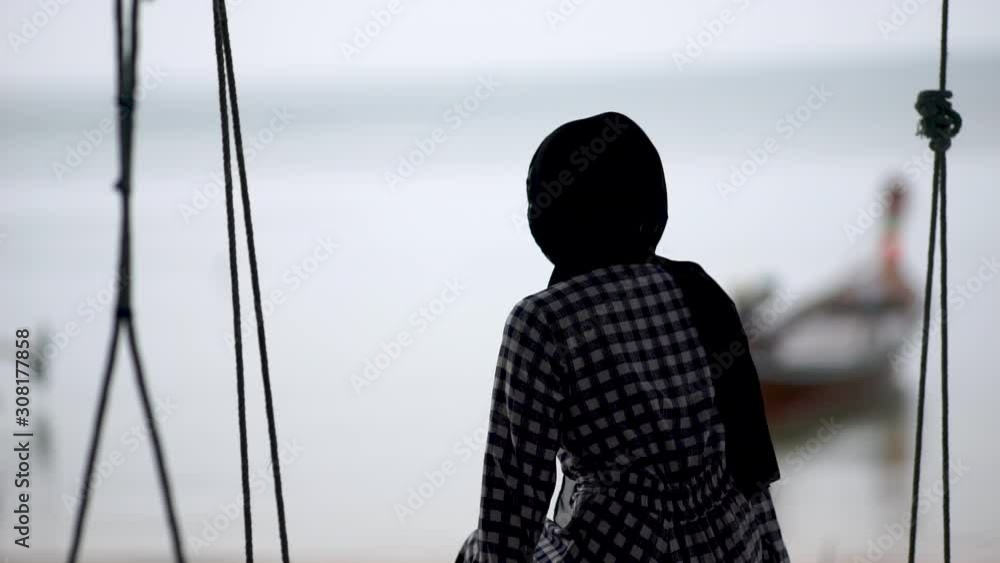 silhouette of a woman sit on deck of cruise ship silhouette of a woman sit on deck of cruise ship