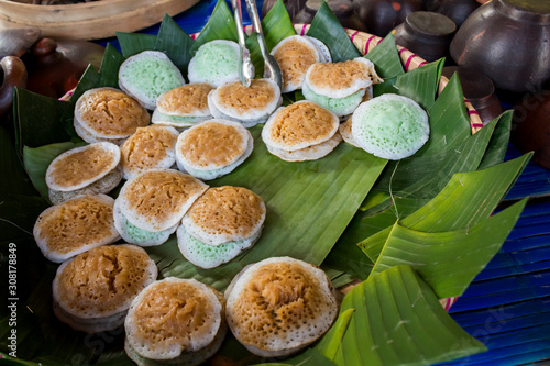 Fotografie Serabi or surabi: Javanese traditional pancake that is made from rice flour with coconut milk or shredded coconut as an emulsifier