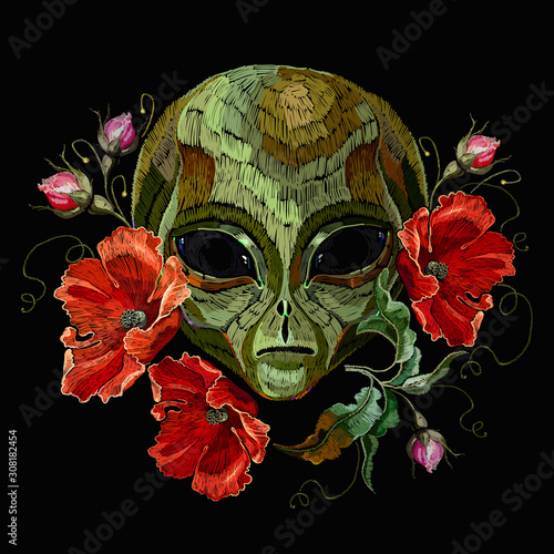 Alien head and red poppies flowers. Embroidery. Pop culture art, science fiction style. UFO, paleocontact concept. Template for clothes, t-shirt design
