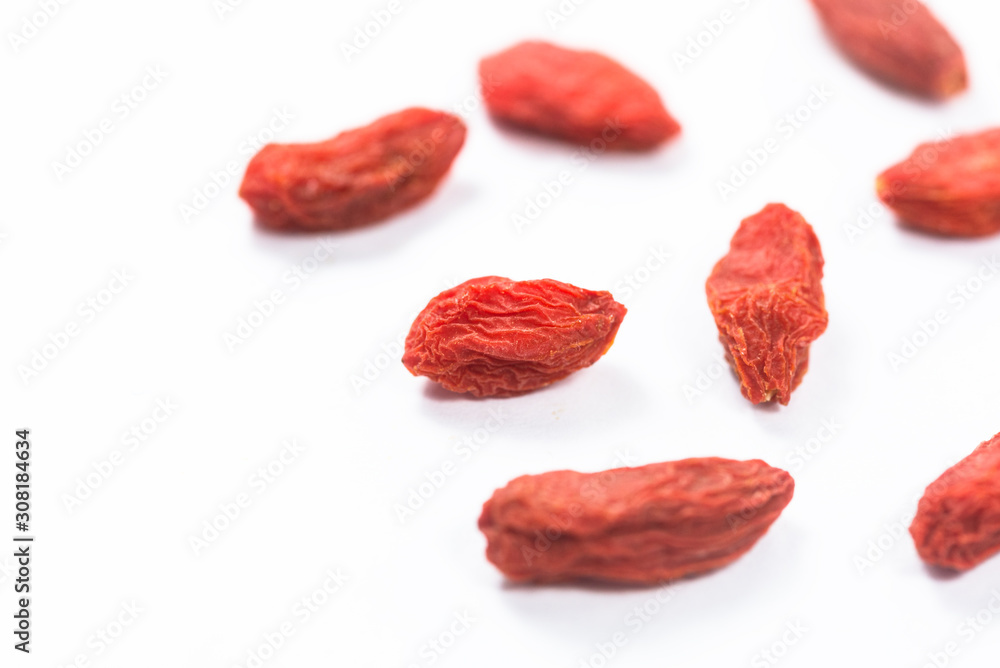 Spread out goji berries on a white background. Spread out goji berries on a white background.