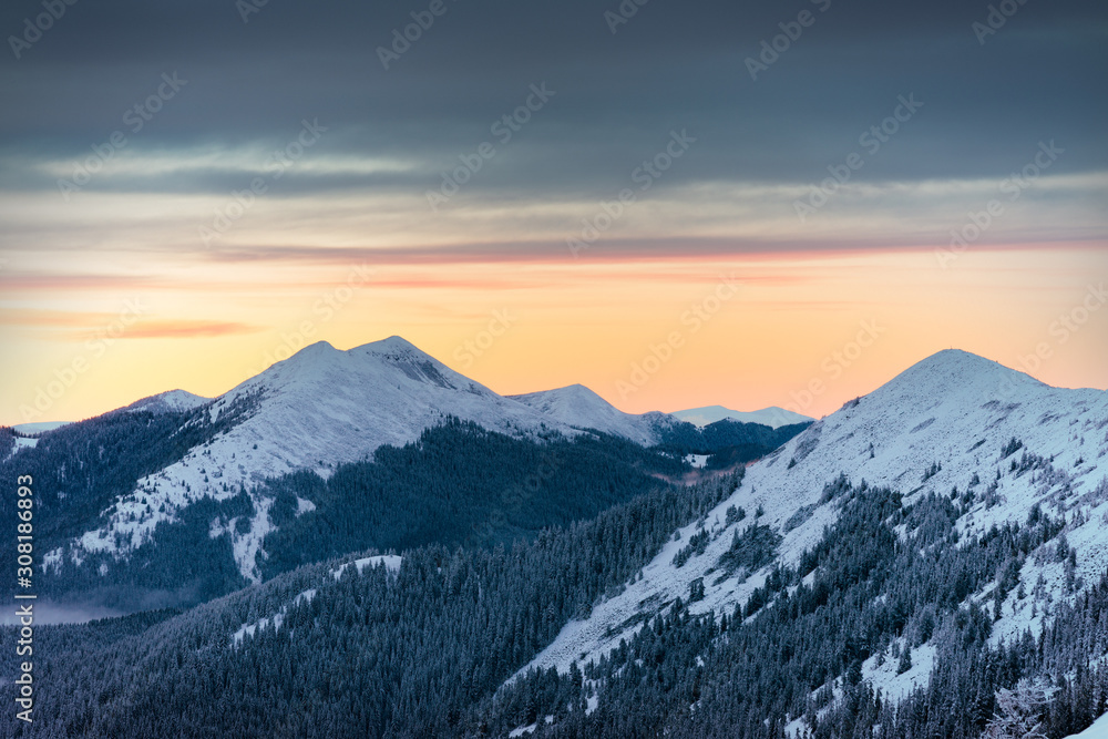 Sunset in winter mountains
