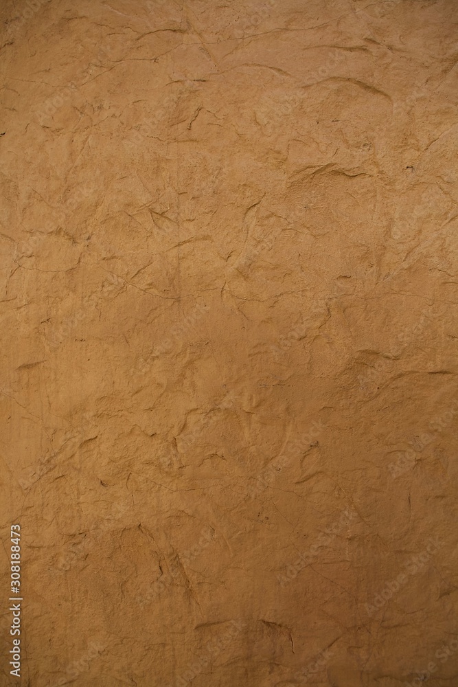 brown clay wall texture closeup brown clay wall texture closeup