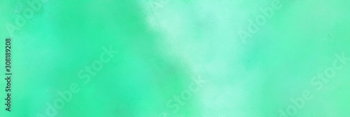 abstract painting background graphic with turquoise and aqua marine colors and space for text or image. can be used as header or banner
