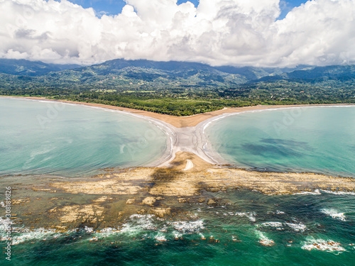 Aerial view National Park Punta Uvita Beautiful beach tropical forest pacific coast Costa Rica shape whale tail photo