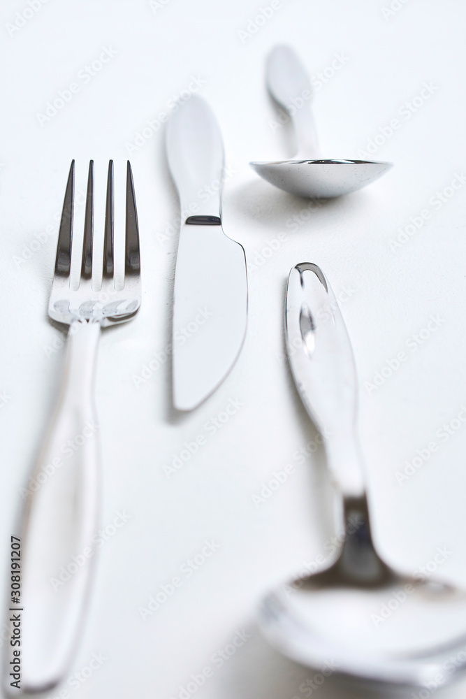 Kitchen knifes, spoons and forks. Cutlery Kitchen knifes, spoons and forks. Cutlery