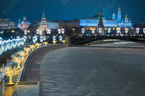 Moscow. Russia. Moscow river in the winter. Frozen river near the Kremlin. Night Moscow decorated for Christmas. Grand Kremlin Palace. Bridges of the capital. New Year's illumination. Rest in Russia