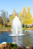A fountain on a pond