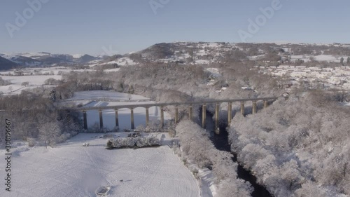 circling anti-clockwise around an aqueduct in the snow photo