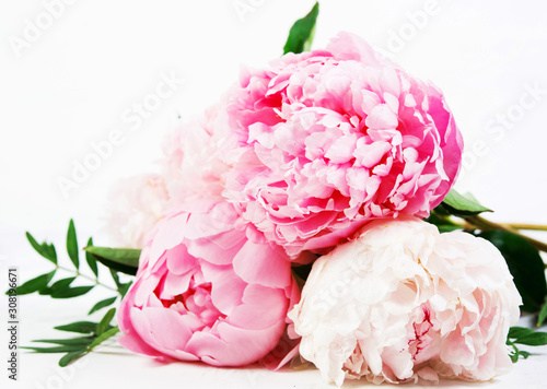 Fototapeta Naklejka Na Ścianę i Meble -  Close up  bouquet of fresh beautiful flowers lies on a white background . Horizontal photo.