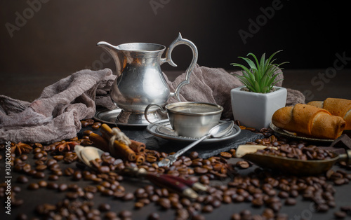 Black coffee on an old background in a cup