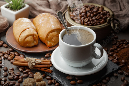 Black coffee on an old background in a cup