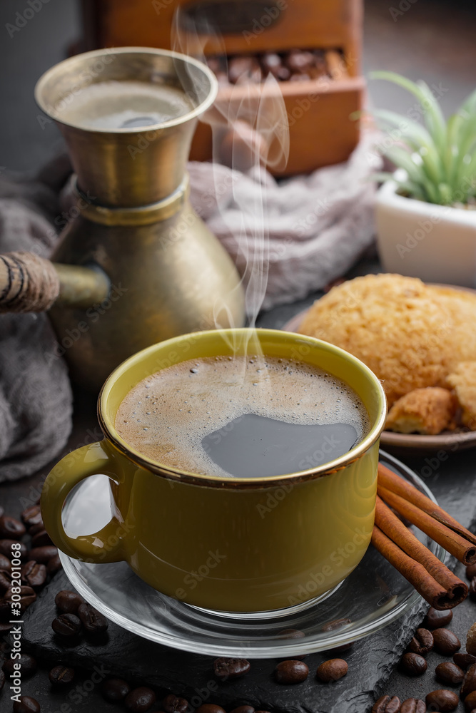 Black coffee on an old background in a cup Black coffee on an old background in a cup