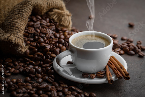 Black coffee on an old background in a cup