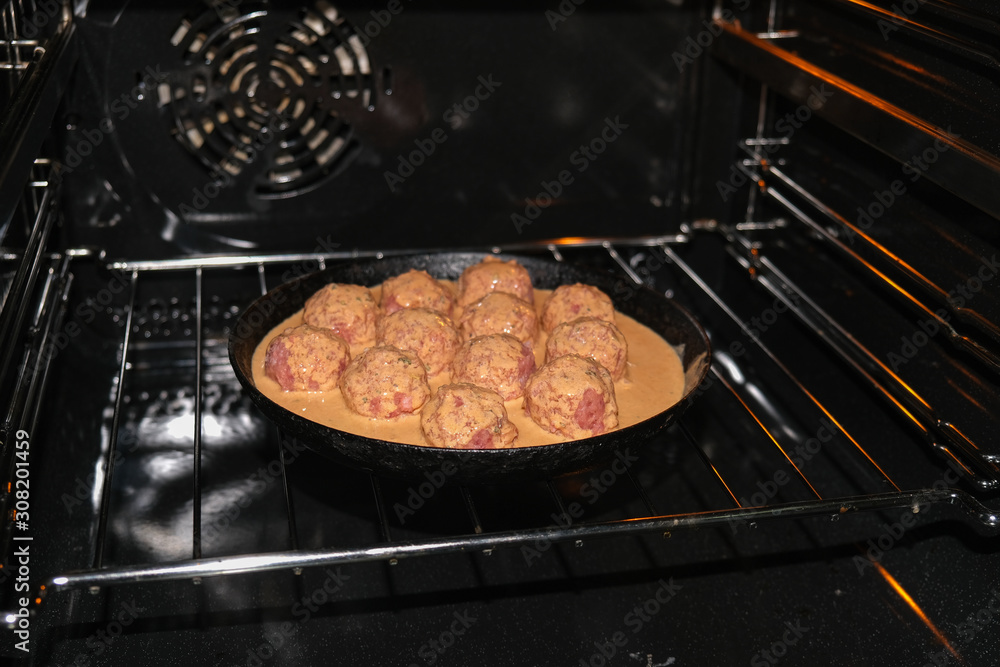 Semifinished. Cooking meatballs in the oven with sauce. Semifinished. Cooking meatballs in the oven with sauce.