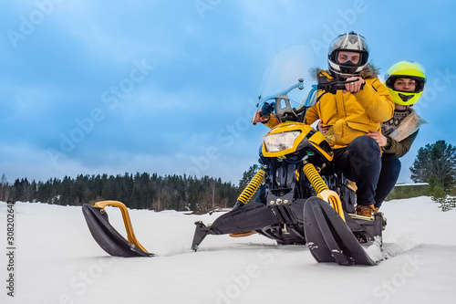 Billede på lærred Riding a snowmobile