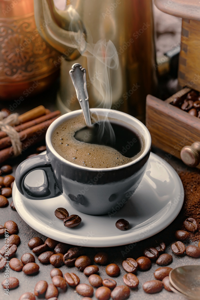 Black coffee on an old background in a cup Black coffee on an old background in a cup