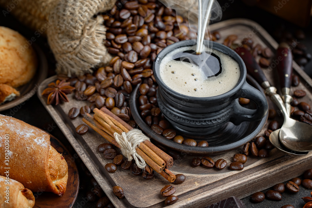 Black coffee on an old background in a cup Black coffee on an old background in a cup
