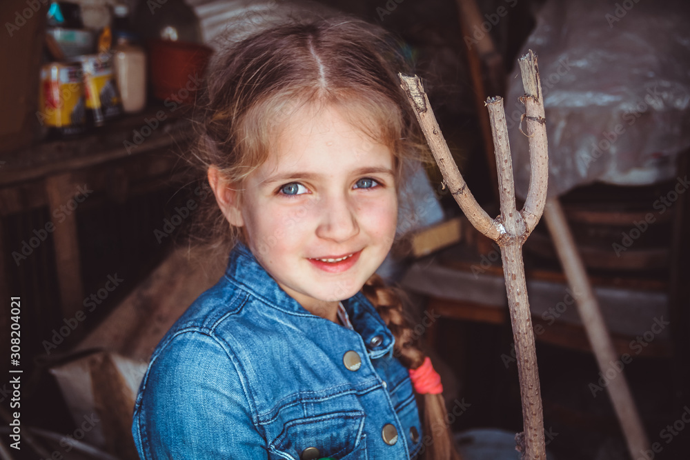 Portrait of little caucasian girl in casual clothes at home