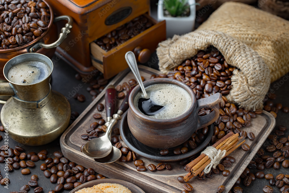 Black coffee on an old background in a cup Black coffee on an old background in a cup