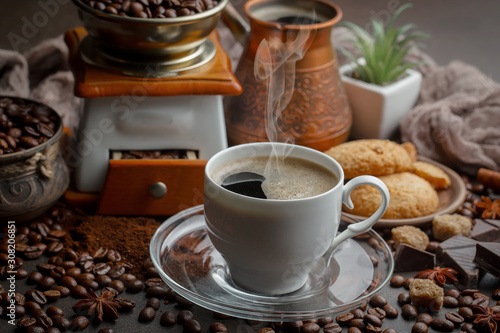 Black coffee on an old background in a cup