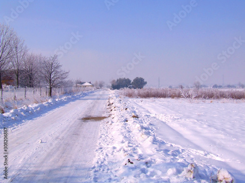 Winter village road © Ewa