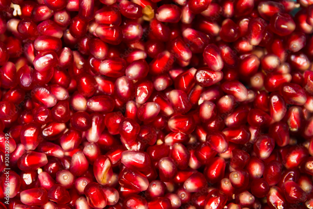Fresh pommegranate grains backdrop Fresh pommegranate grains backdrop