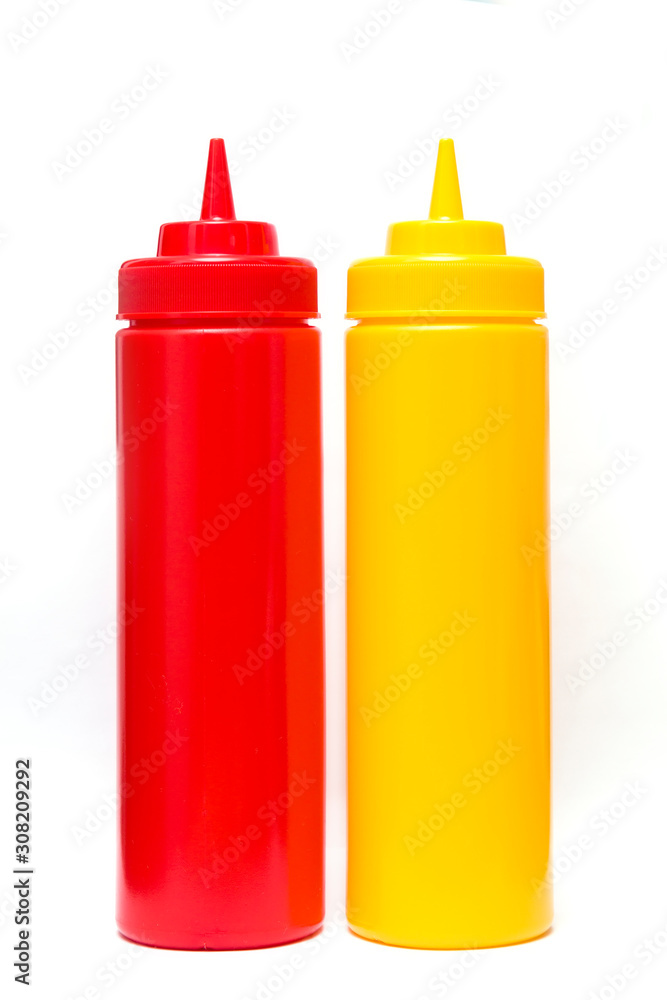 Ketchup and mustard bottle isolated on white background Ketchup and mustard bottle isolated on white background