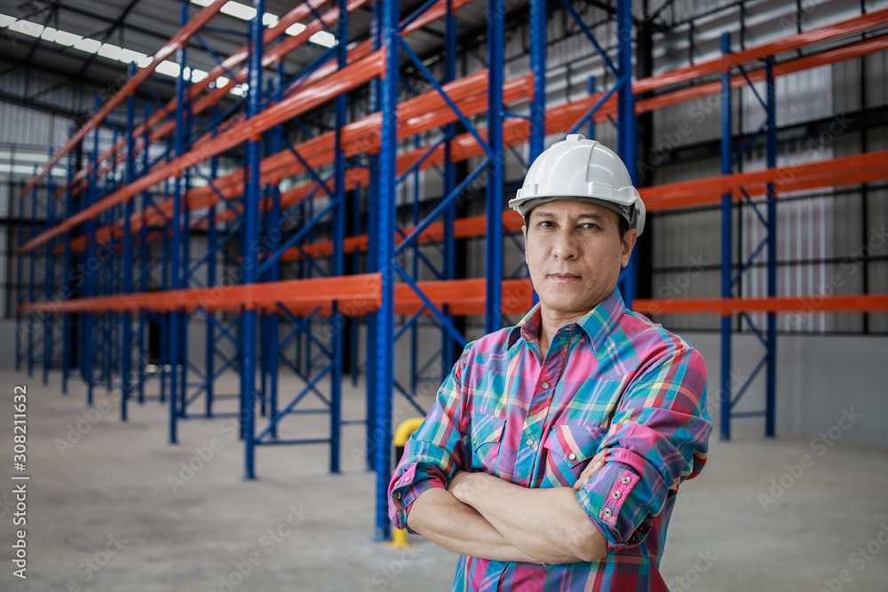 Asian Engineer man working in building factory Asian Engineer man working in building factory